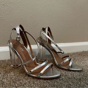 Report Silver and Clear Heel